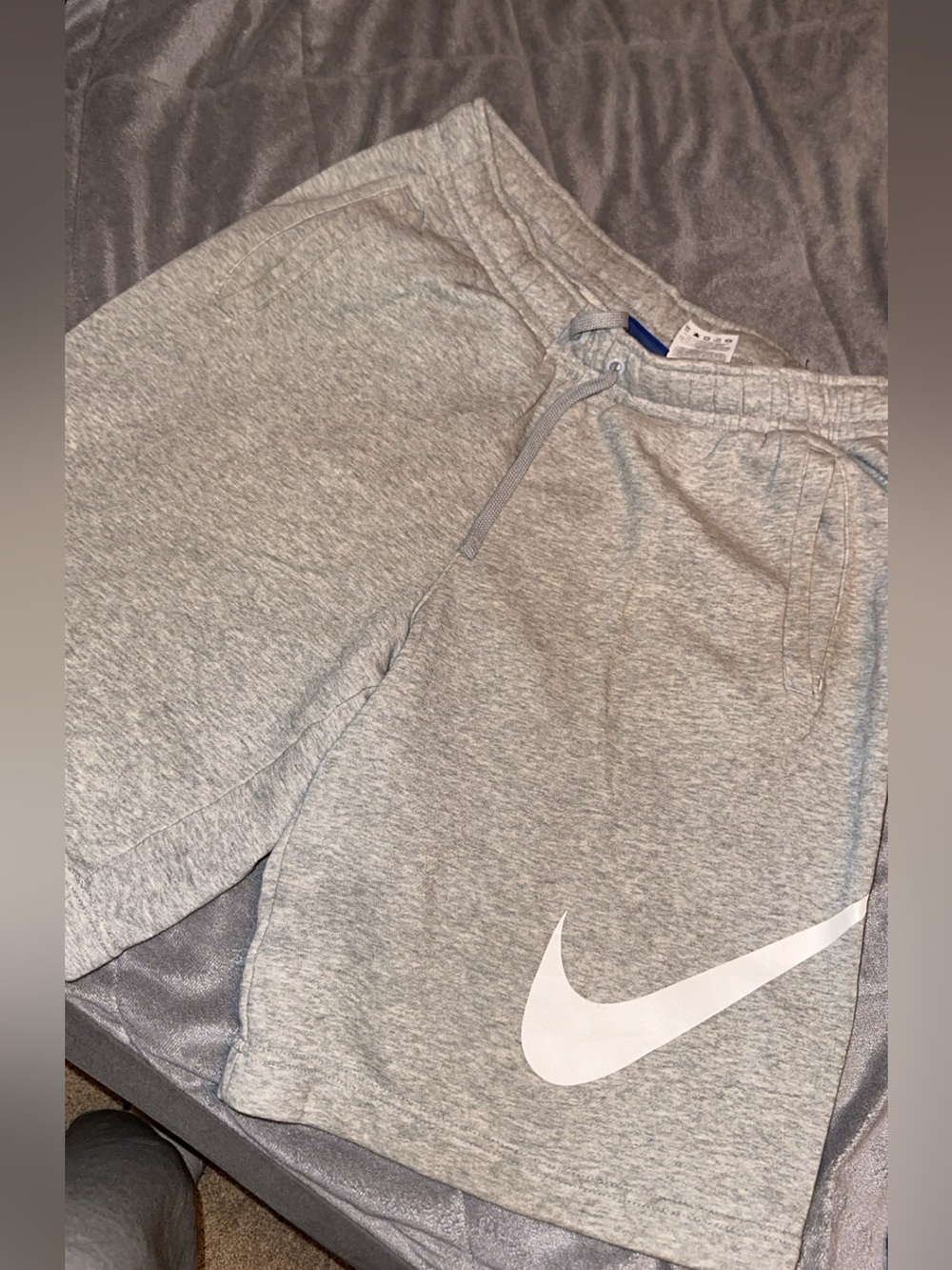 Nike Grey Men Athletic Shorts with White Swoosh Size M
